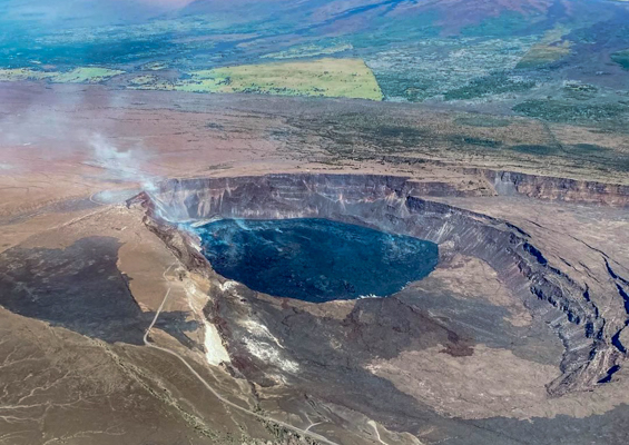 bluehawaiian helicopter around the volcanoes smoke slider