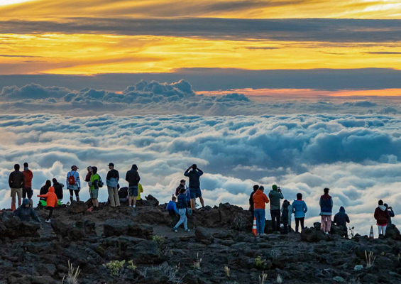 haleakala sunset crowd along summit road maui slider