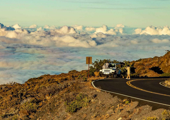 haleakala sunset jeep and visitors crater road maui slider