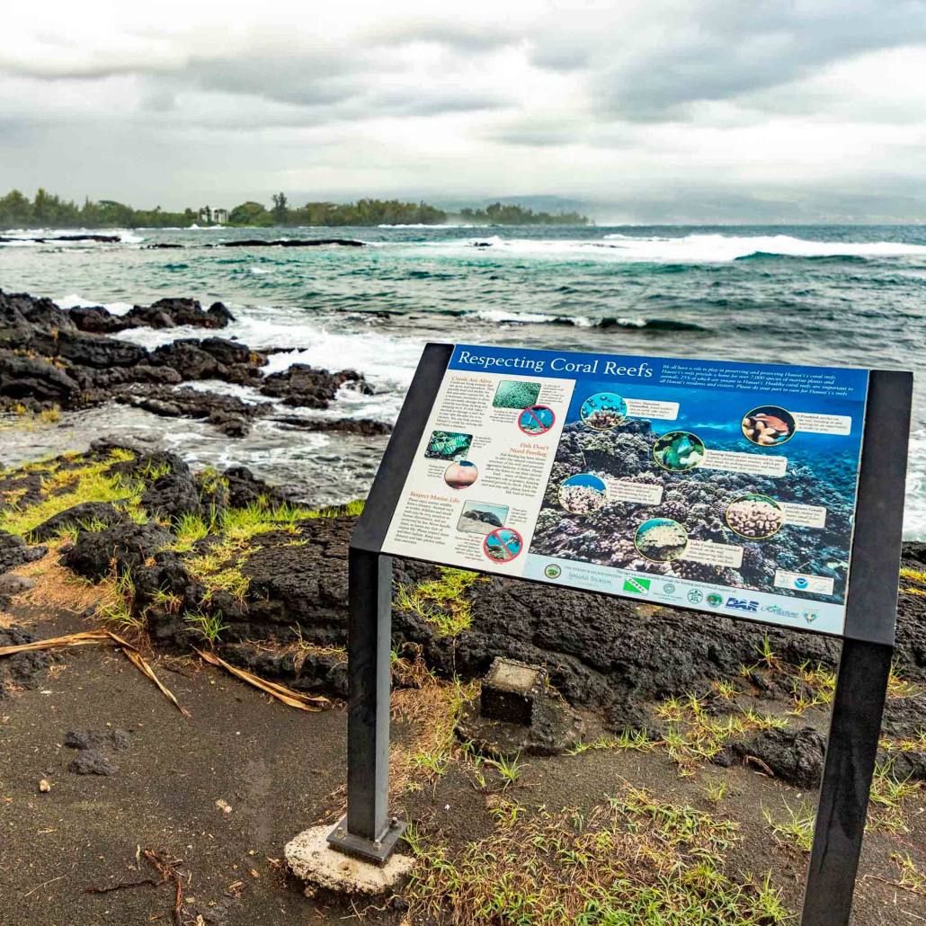 richardson black sand beach park sign and coast hilo big island 