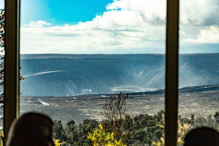 Sweeping views of the caldera are seen through the windows of Volcano House Lodge