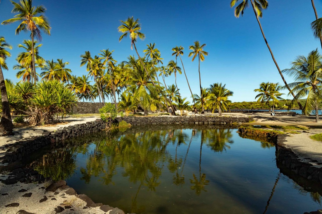 Fish Ponds and Visitor at Pu'uhonua O Honuanua Heiau National Historical Site Big Island Hawaii