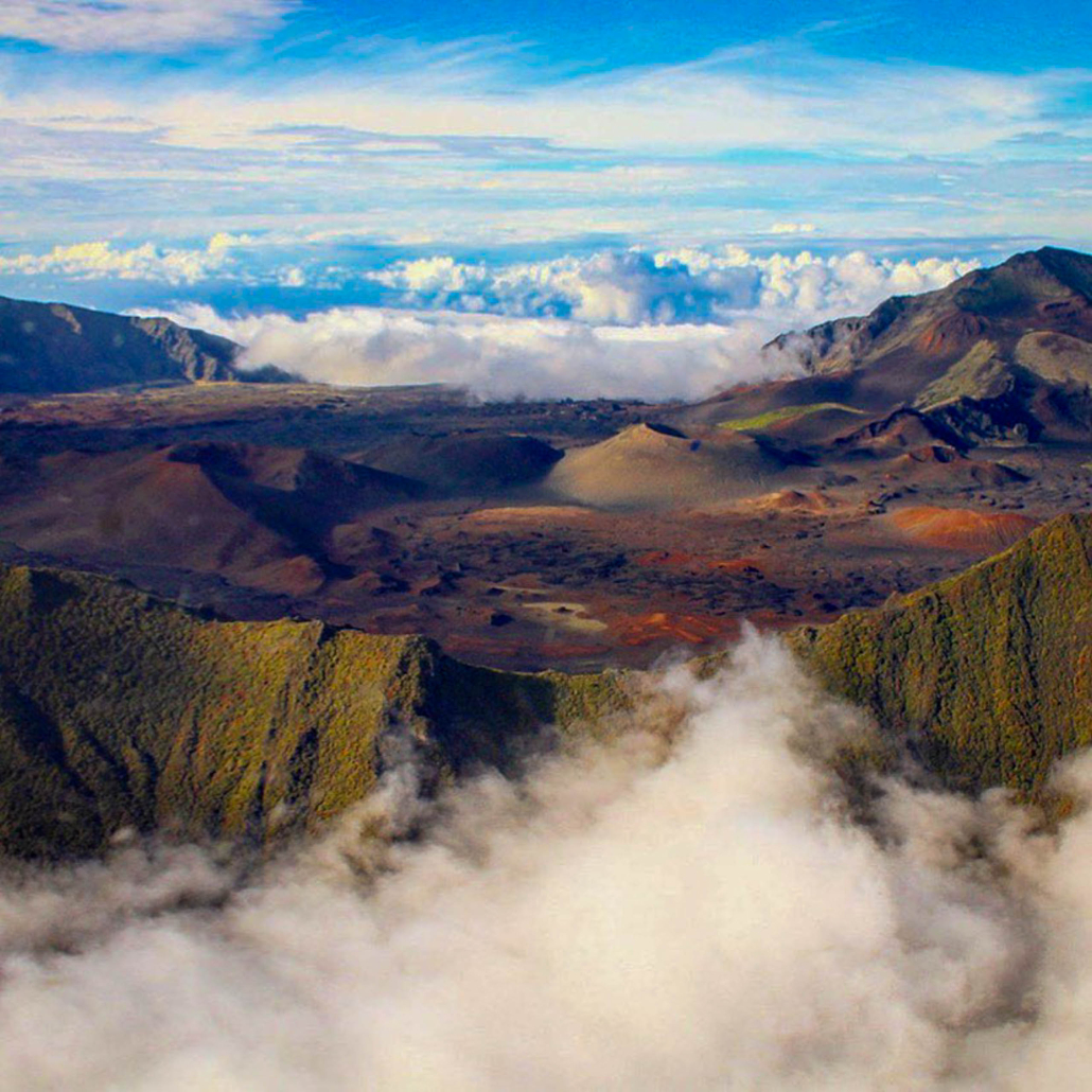 blue hawaiian helicopters haleakala and hana mountain cloud