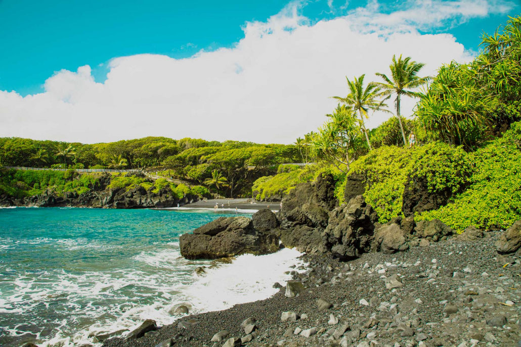 enjoying stunning views of black sand beach maui hawaii