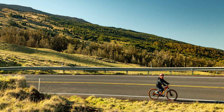 experience haleakala crater road bike rider