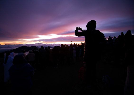 watch the sun slowly creep over the horizon haleakala sunrise tour haleakala national park maui slider