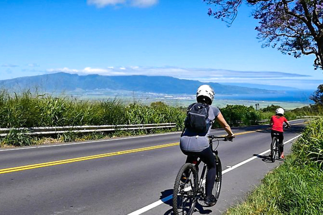 mountainriders haleakala self guided bike tour guest biking downhill