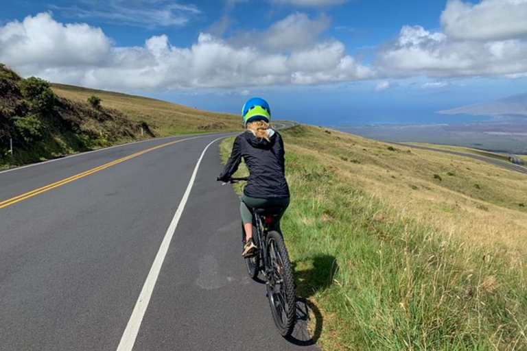 mountainriders haleakala self guided bike tour woman downhill